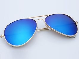Slnečné okuliare AVIATOR - pilotky zlatý kovový rám modré sklá